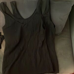 Source Unknown , Two Black Sleeveless Tank Tops